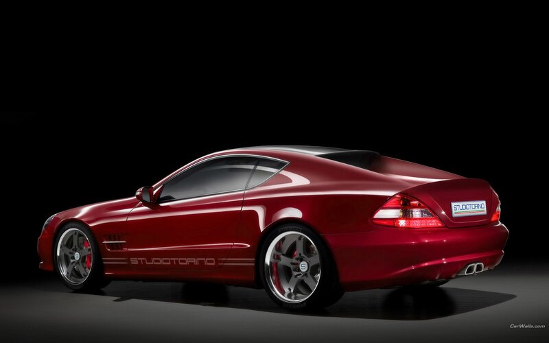 red sports car studio shot