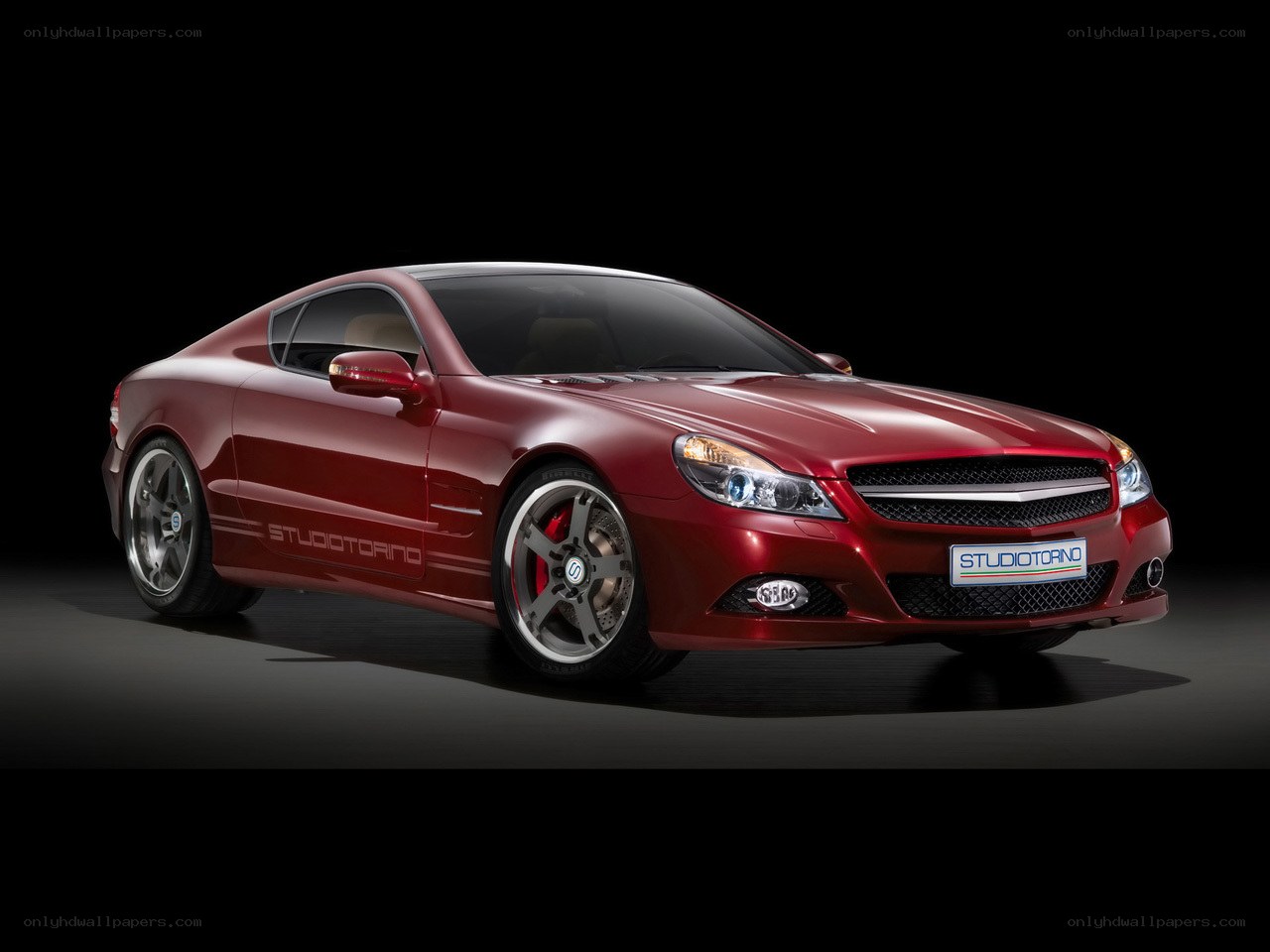 Red sports car studio shot