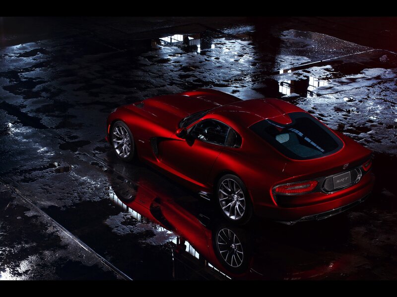 Red Sports Car — Wet Pavement