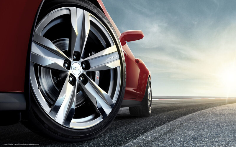 Red sports car wheel close-up