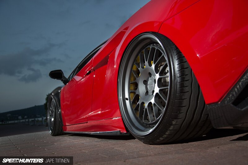 Red Sports Car Wheel — Dramatic, Sunset, Photograph