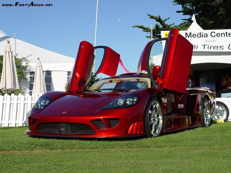 red sports car with doors open