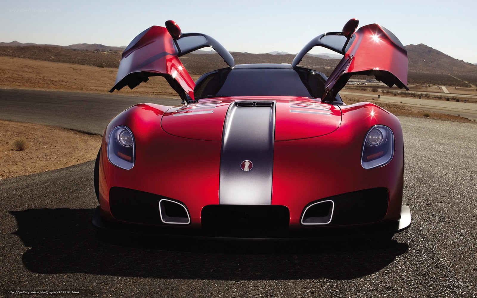 Red sports car with doors open