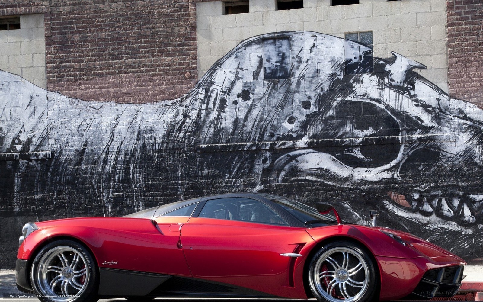 Red sports car with graffiti art