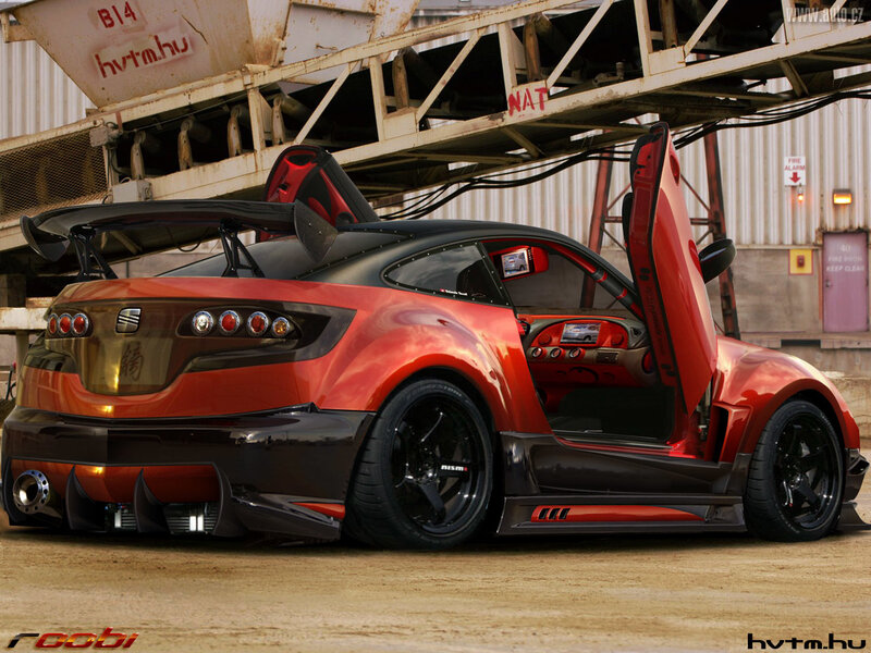 red sports car with gullwing doors