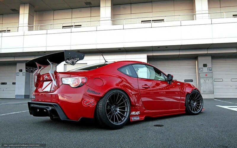 red sports car with large wing