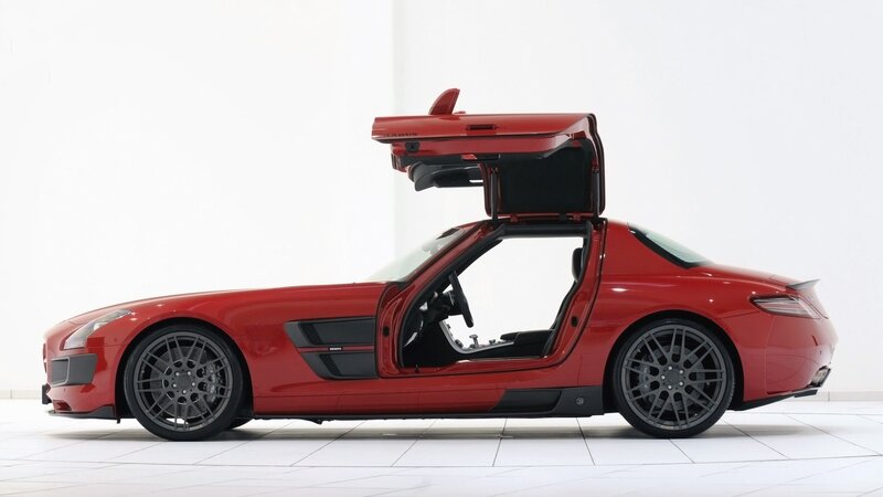 Red sports car with open door