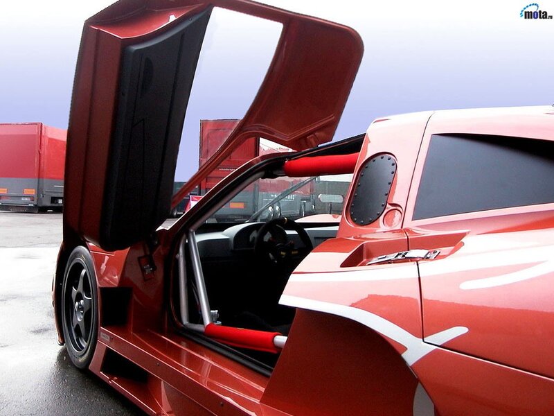 red sports car with open door