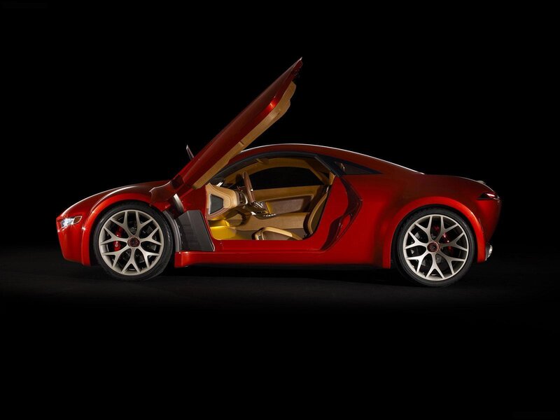 Red sports car with open door