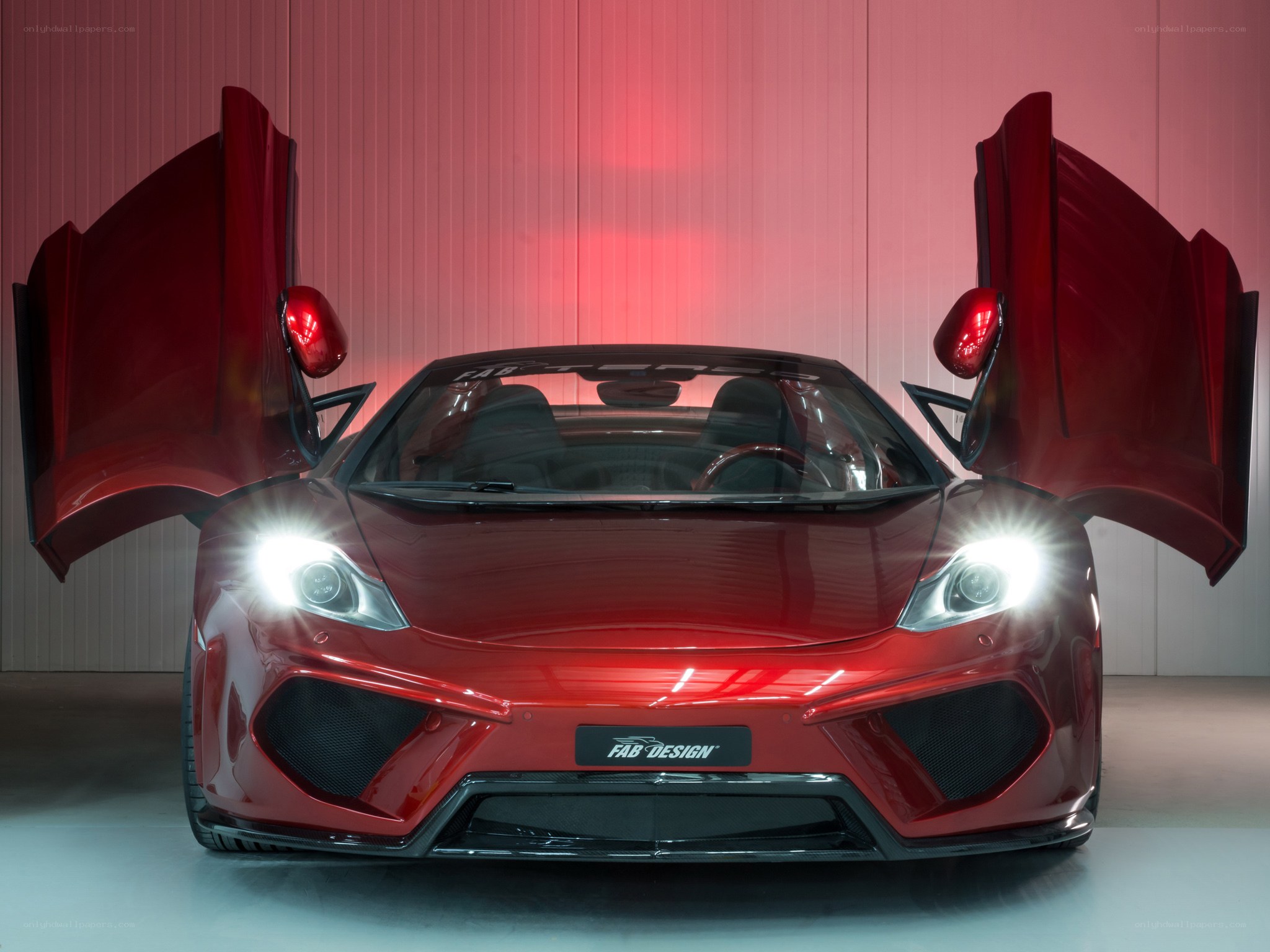 Red sports car with open doors