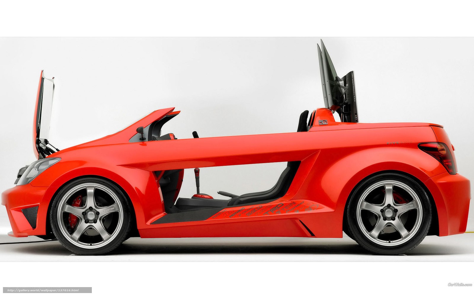 red sports car with open doors