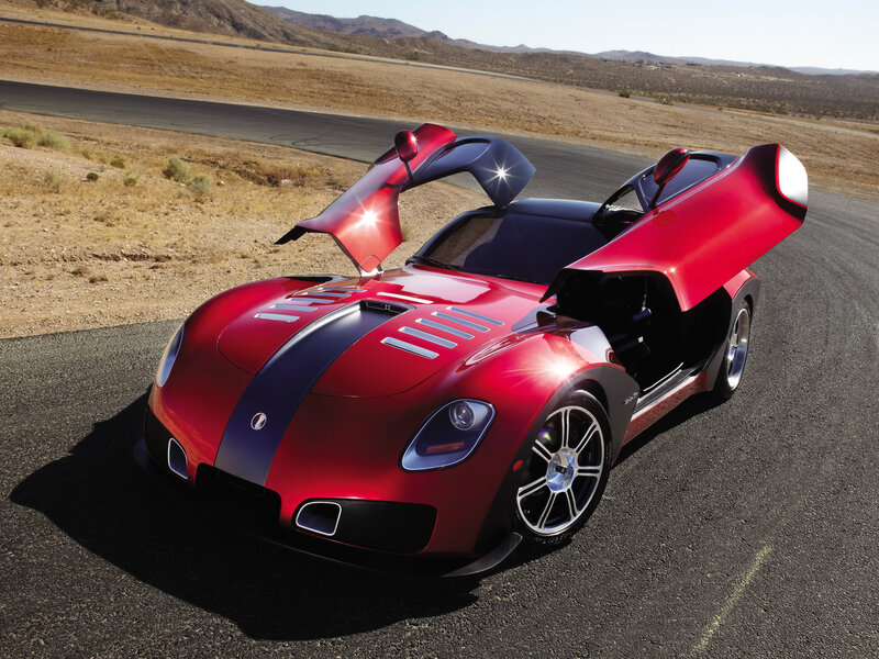 Red sports car with open doors