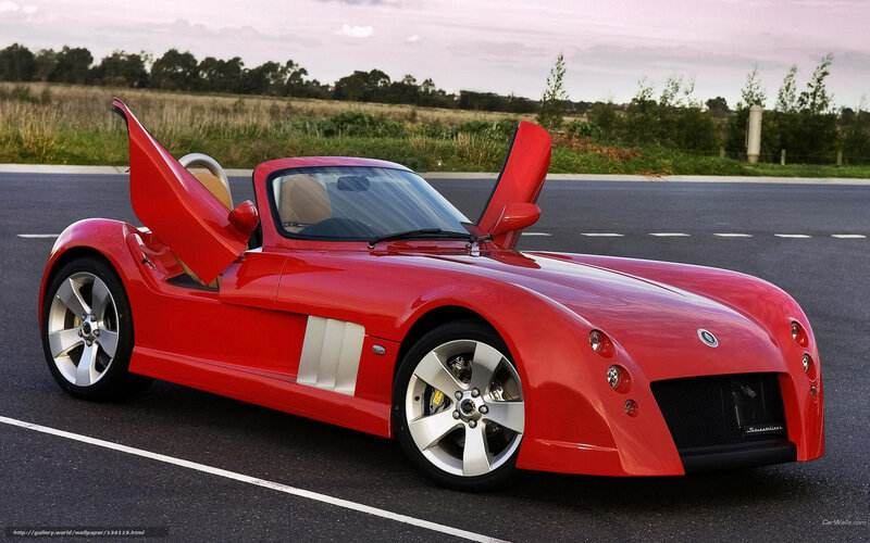Red sports car with open doors