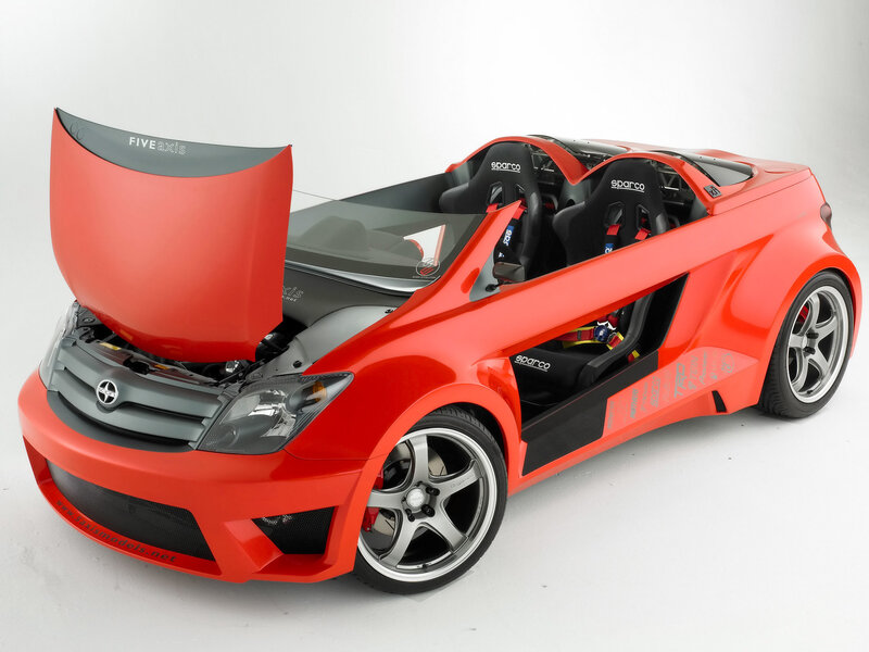Red sports car with open hood