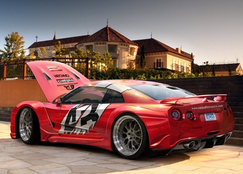 red sports car with open hood
