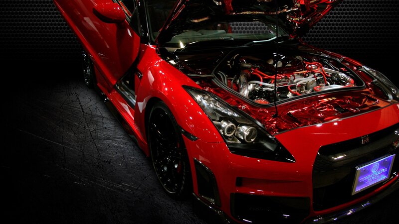 Red sports car with open hood
