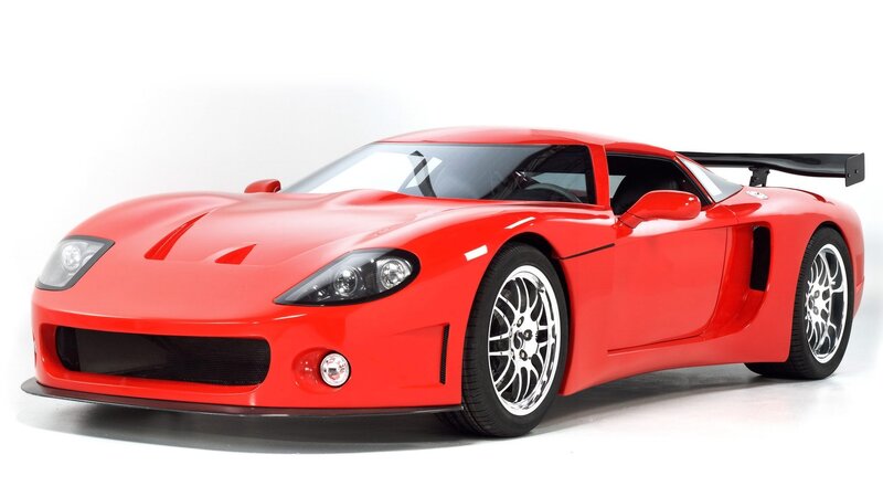 red sports car with rear wing