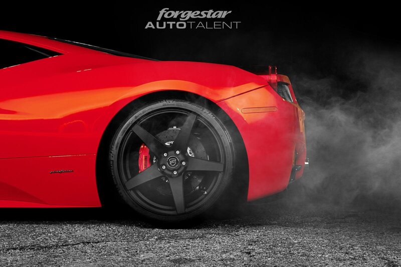 red sports car with smoke