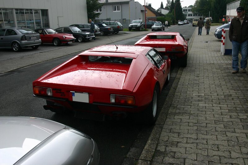 Red sports cars on display