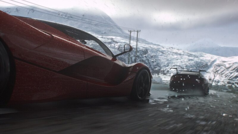 Red Sports Cars on Road — Dramatic
