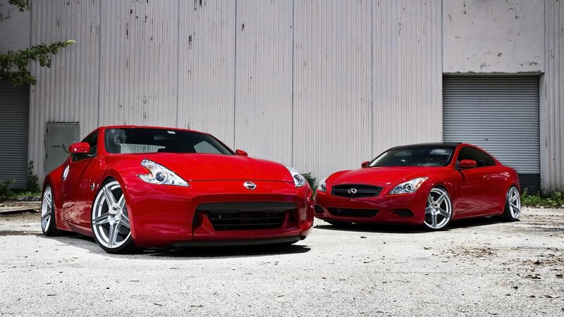 Red sports cars parked