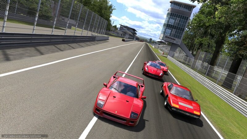 Red sports cars racing on track