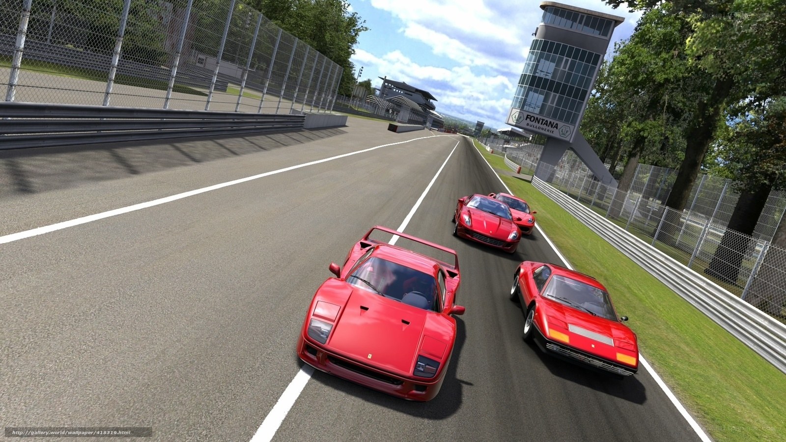 Red sports cars racing on track