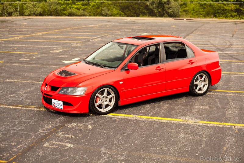 Red Sports Sedan — Calm, Afternoon, Photograph