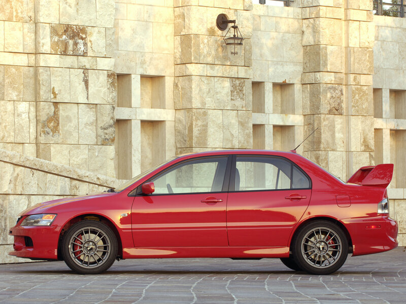 Red Sports Sedan — Dramatic, Afternoon