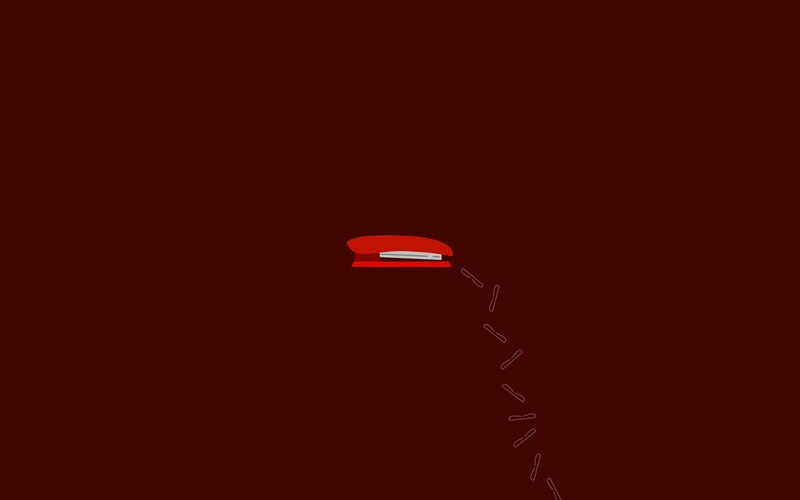 Red Stapler with Paperclips — Minimalist