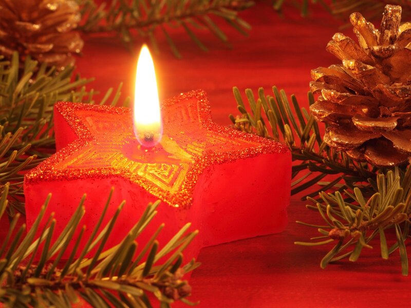 Red star candle with pine