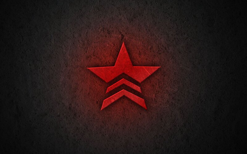 Red star logo on dark background