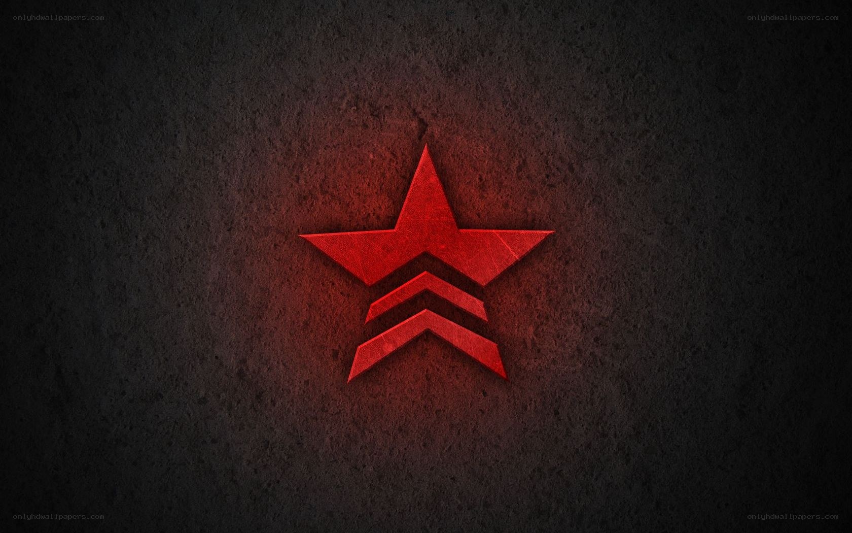 Red star logo on dark background