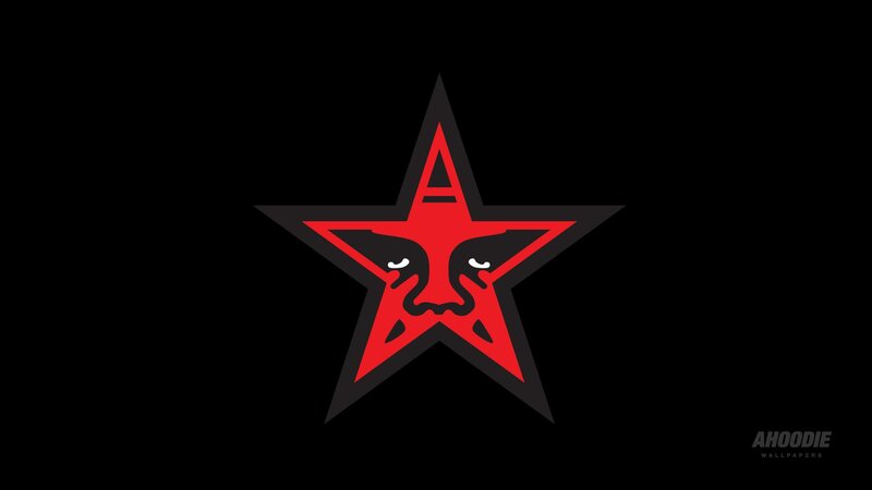 red star logo with face