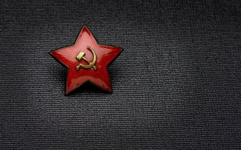 Red star pin with hammer and sickle