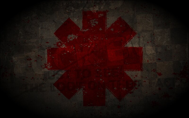 Red star symbol on dark background