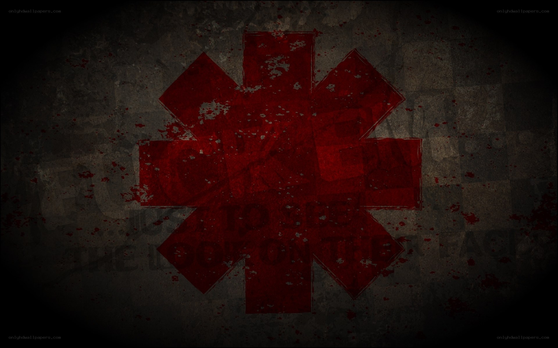 Red star symbol on dark background