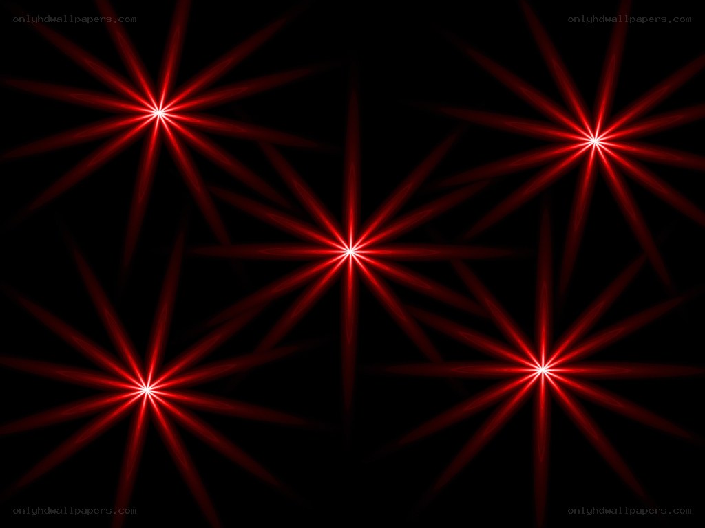Red starburst lights on black