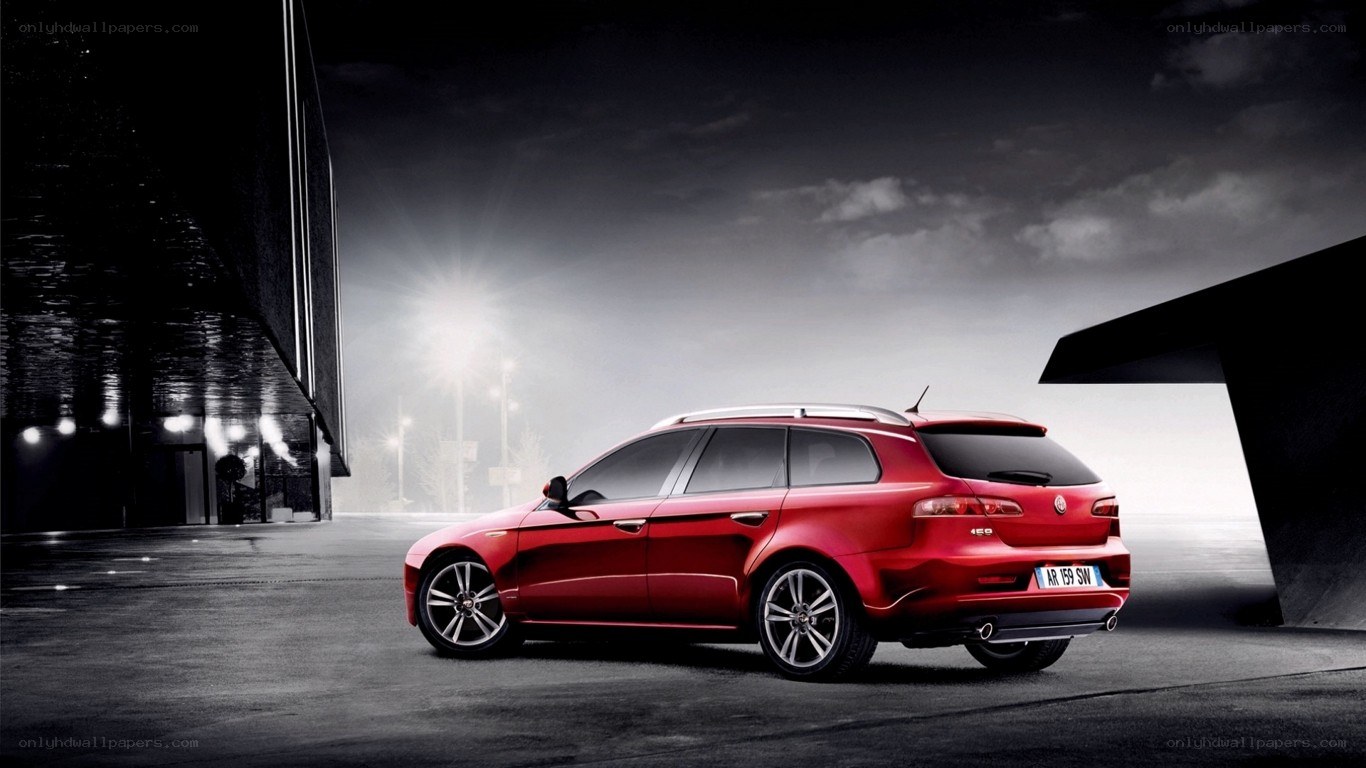 Red station wagon at night
