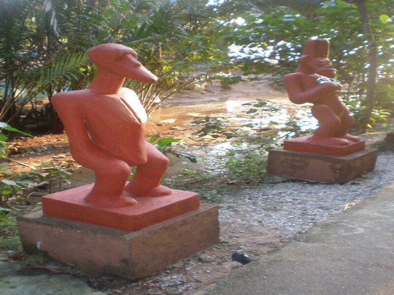 Red Statues in Garden