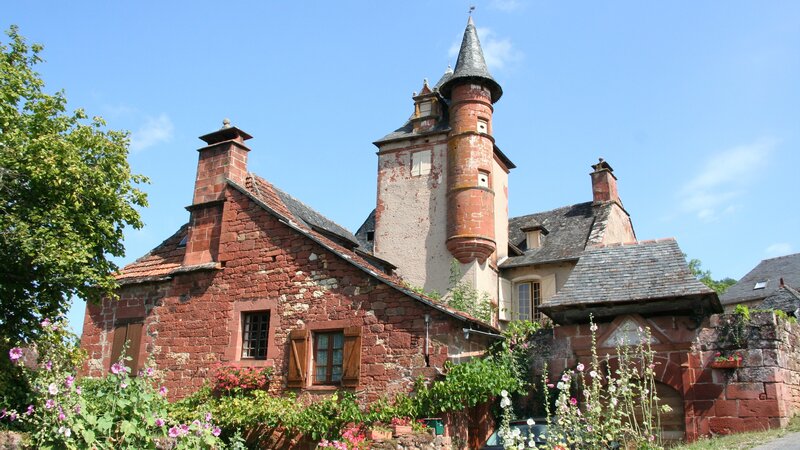 Red Stone House with Tower