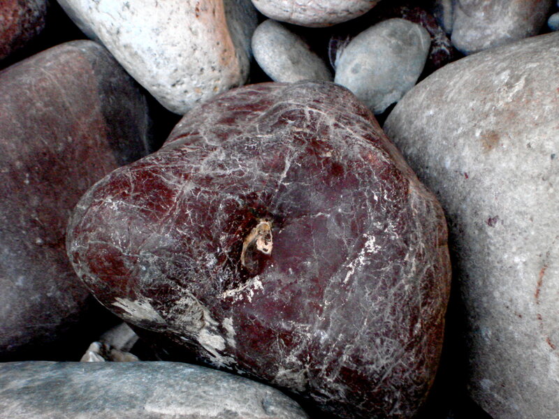 Red Stone with White Veins