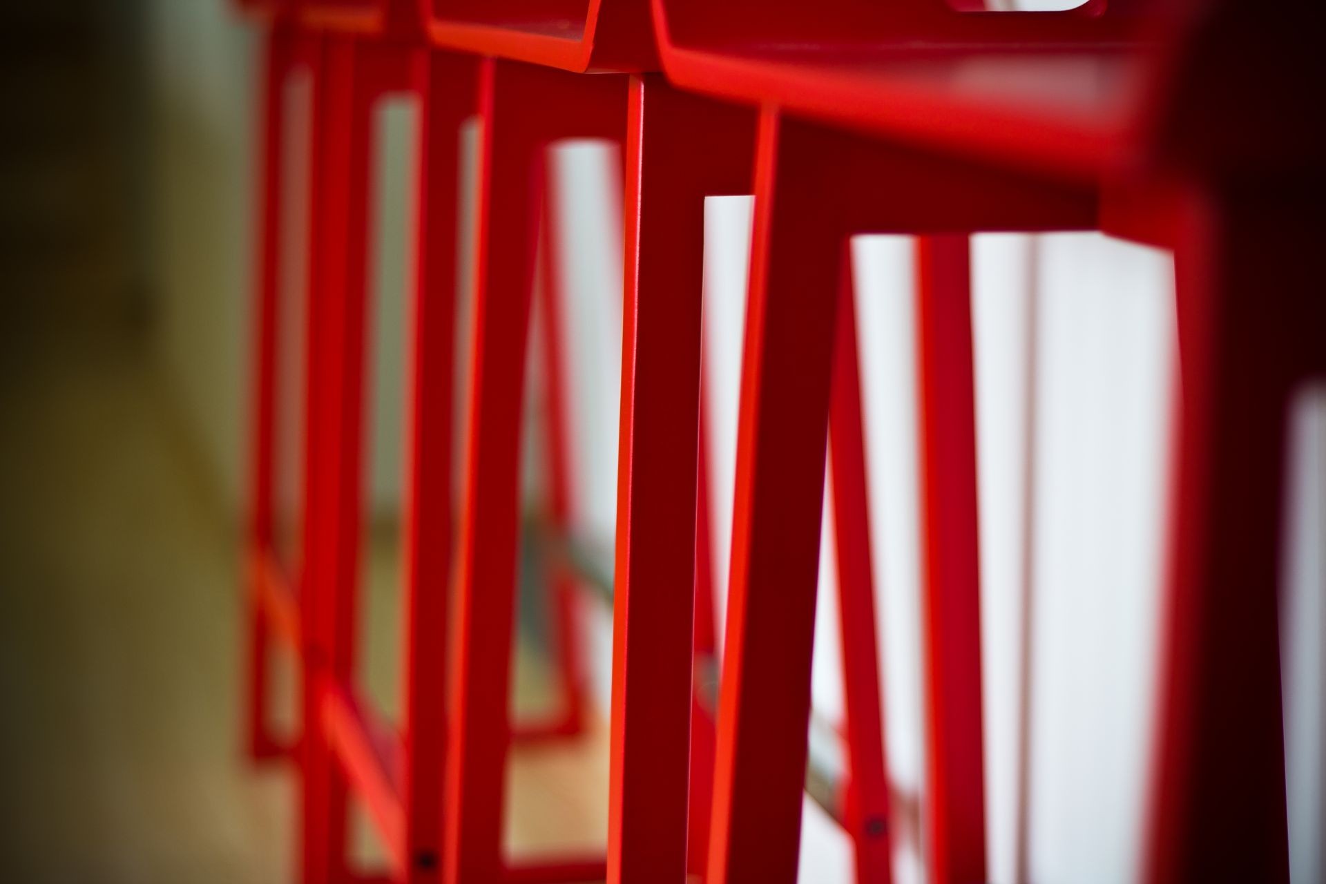 Red stools in a row