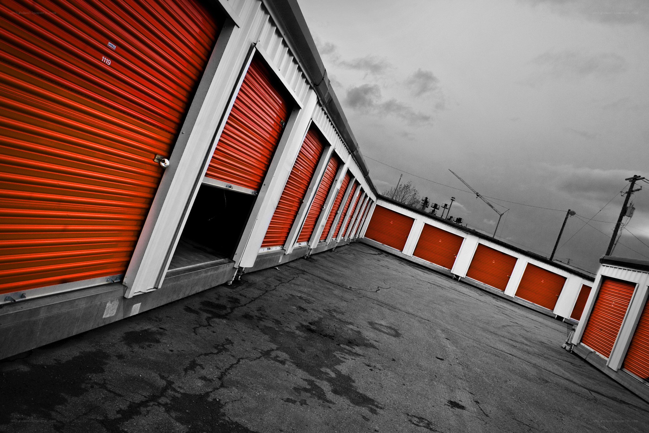Red storage units in black and white