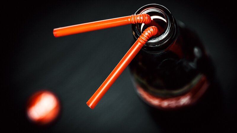 Red Straws in Bottle