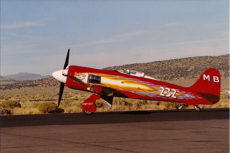 Red Stunt Plane on Runway