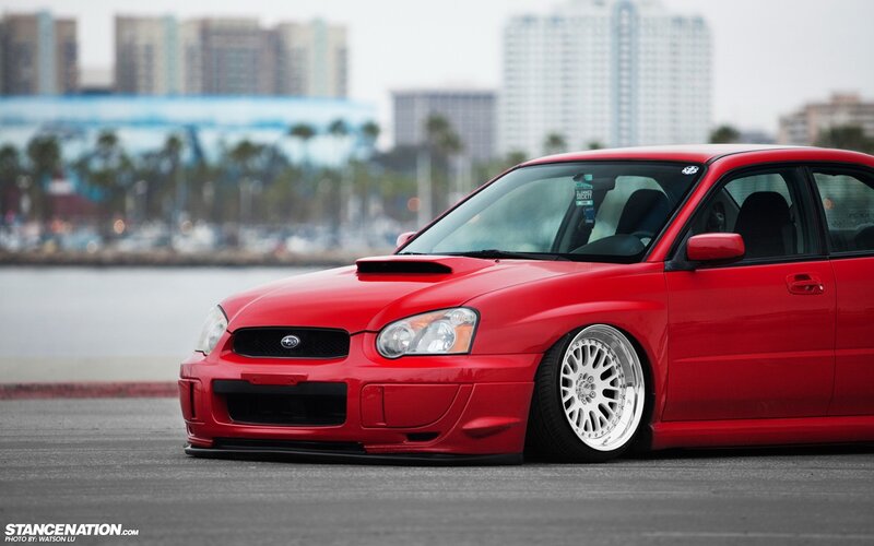 red subaru stanced car