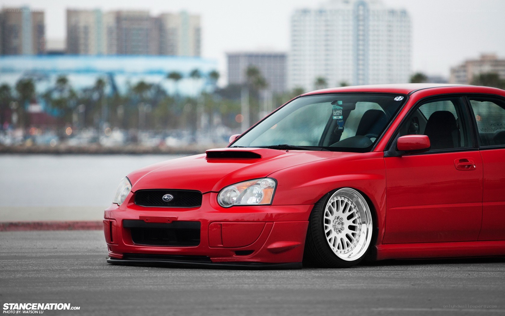 red subaru stanced car