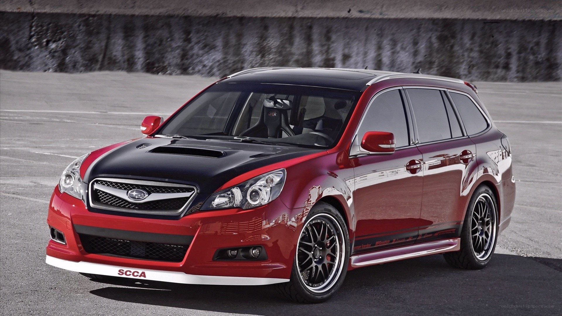 Red Subaru station wagon