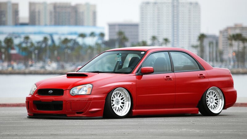Red Subaru WRX sedan